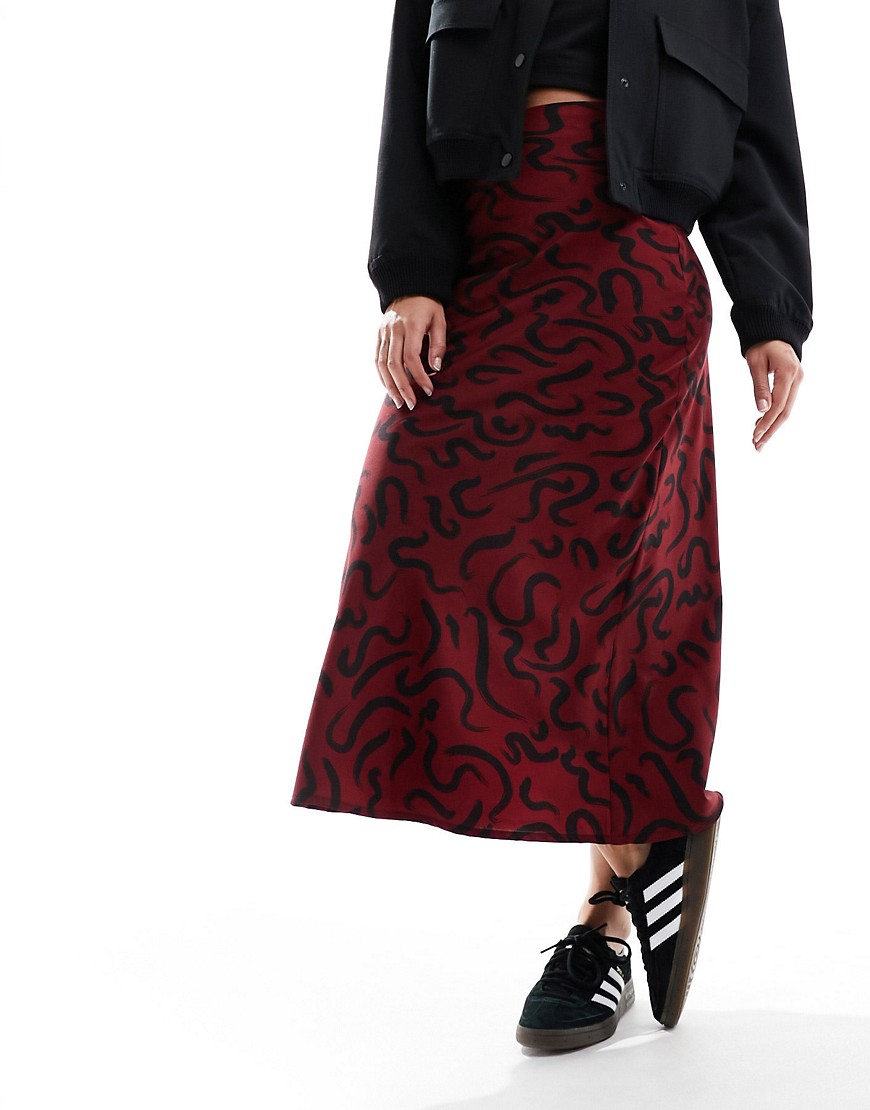 Wednesday's Girl swirl print bias cut midaxi skirt in deep red