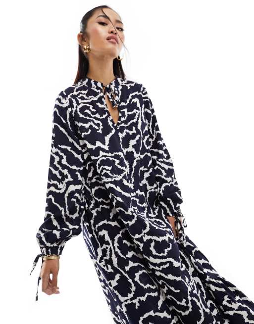 Wednesday's Girl tie-neck detail midi dress in navy zebra