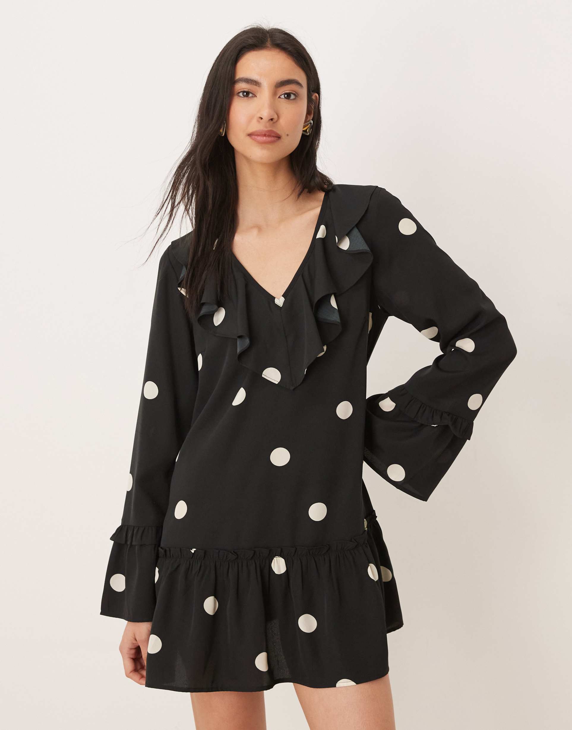 wednesday's girl tiered floaty mini dress in black polka dots