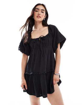 Wednesday's Girl tiered frill detail mini dress in black - view 1