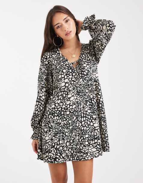 Wednesday's Girl v neck floaty abstract print mini dress in black - view 1