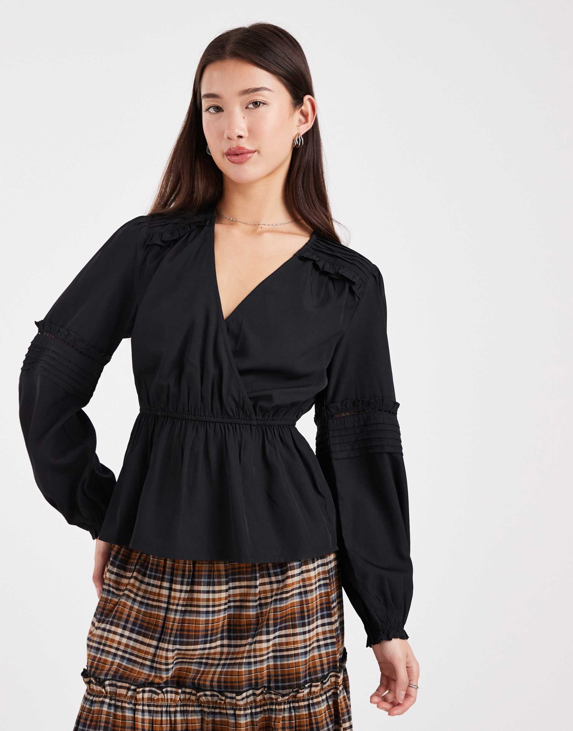wednesday's girl v neck peplum textured long sleeve top in black