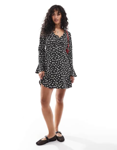 Wednesday's Girl - Vestito corto nero fiorellini con maniche a campana - view 1