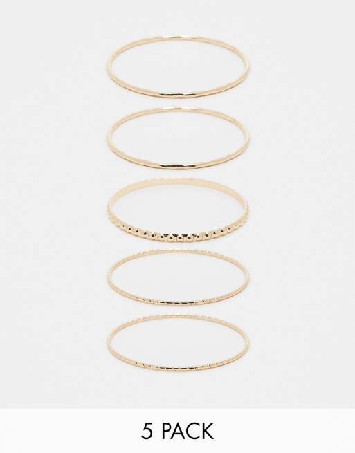Weekday 5-pack bangle bracelets in gold