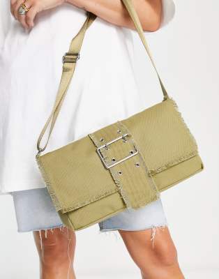 Weekday Weekday 90's raw edge buckle detail shoulder bag in khaki-Green