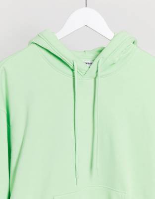 light green sweatshirt