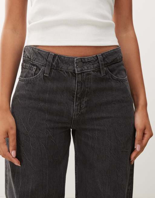Weekday Ample low waist baggy fit jeans in worn black wash
