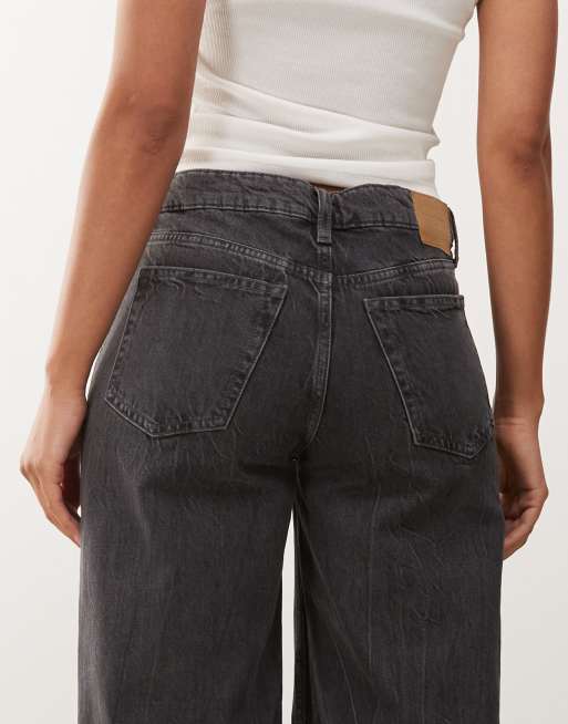 Weekday Ample low waist baggy fit jeans in worn black wash