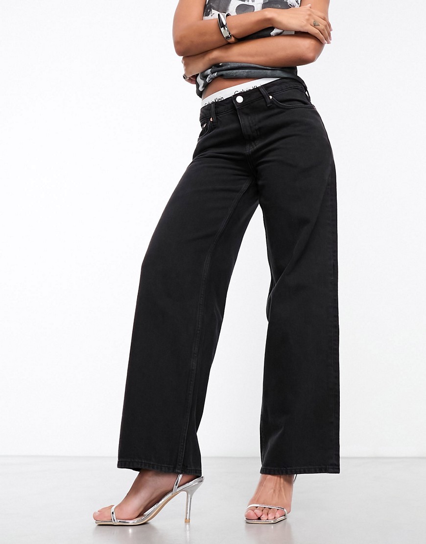 Weekday Ample low waist loose fit straight leg jeans in Black rinse-Blue