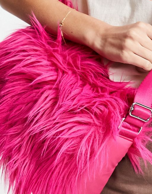 Weekday Annie faux fur handbag in pink | ASOS