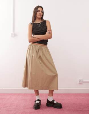 weekday annie sleeveless boat neck top in black and gray stripe