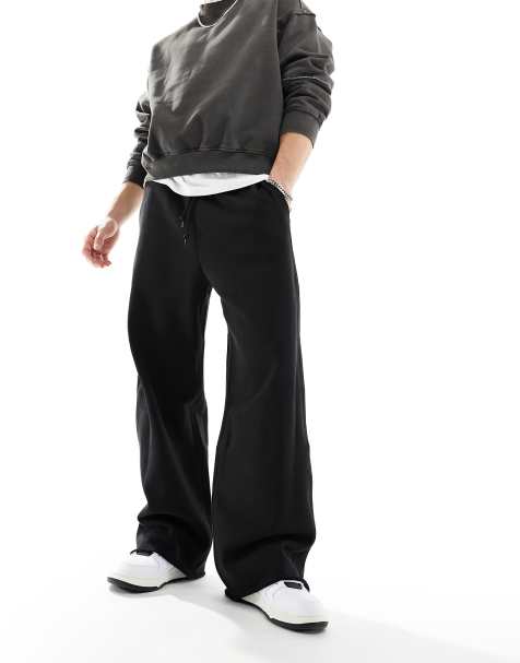 Weekday Astro loose fit joggers in black - view 1