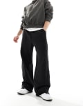 [Weekday] Weekday Astro loose fit trackies in black M Black