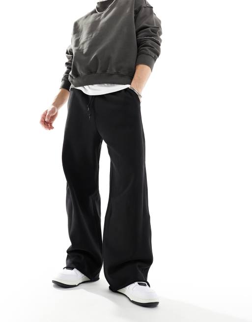 Weekday Astro loose fit trackies in black