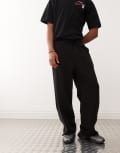 [Weekday] Weekday Astro loose fit trackies in black S Black