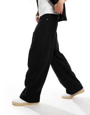 Astro track pants in black