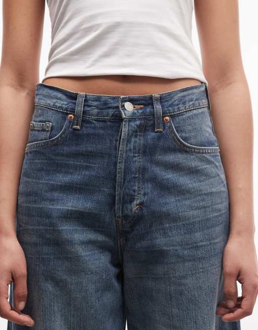 Weekday - Astro - Unisex - Lavtaljede jeans i famlet blå vask i poset pasform, 5 af 5