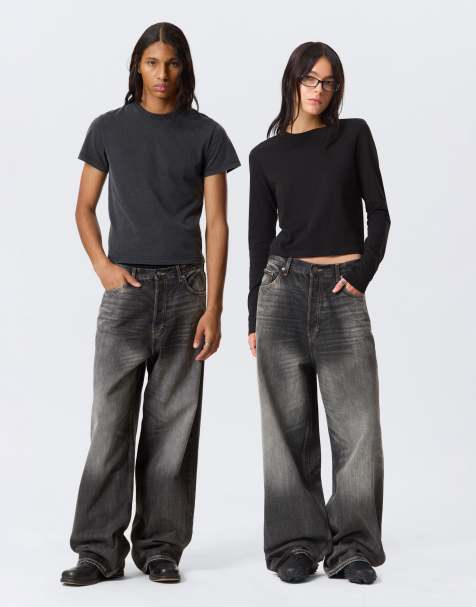 Weekday Astro Unisex low rise baggy fit jeans in faded black wash