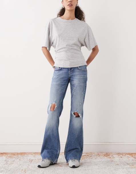 Weekday – Ausgestellte Bootcut-Jeans in Mittelblau im Used-Look - view 1