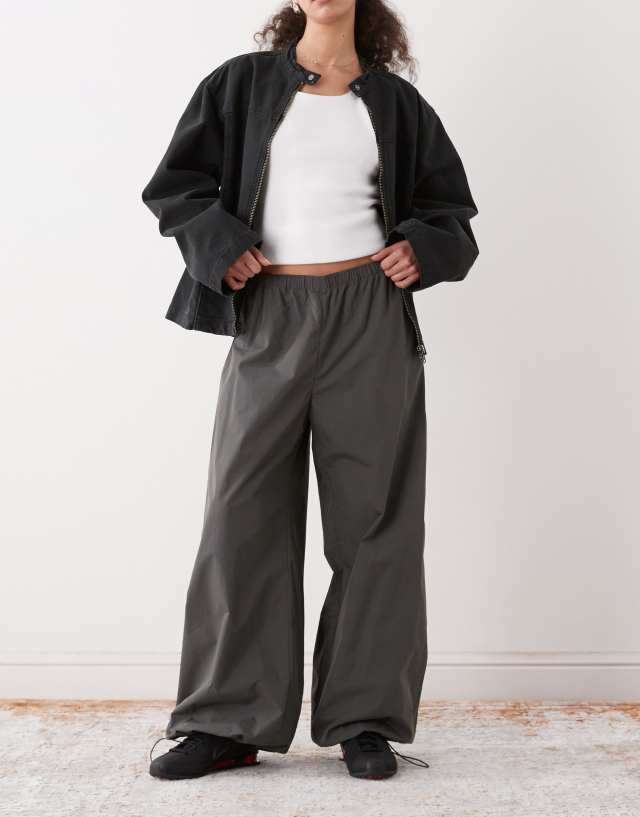 Weekday balloon track pants in dark gray | ASOS