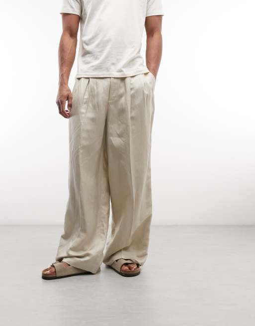 Weekday – Beige, figursydda byxor i linnetyg med vida ben och veck framtill, 2 av 5