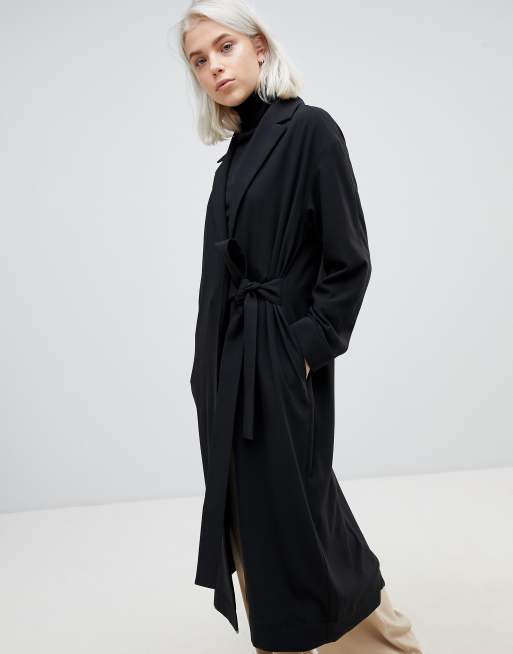 Weekday belted trench coat in black | ASOS