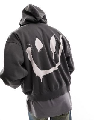 Weekday boxy fit zip through hoodie with back print in black