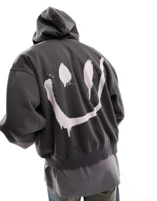 Weekday boxy fit zip up hoodie with back print in off-black