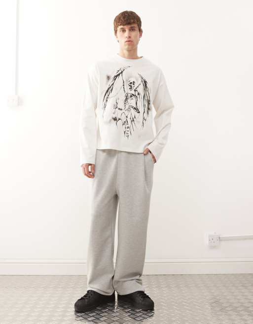 Weekday boxy long sleeve top in white skeleton graphic, 2 of 5
