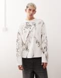 [Weekday] Weekday boxy oversized fit long sleeve t-shirt with all over sketchbook graphic print in white XS White