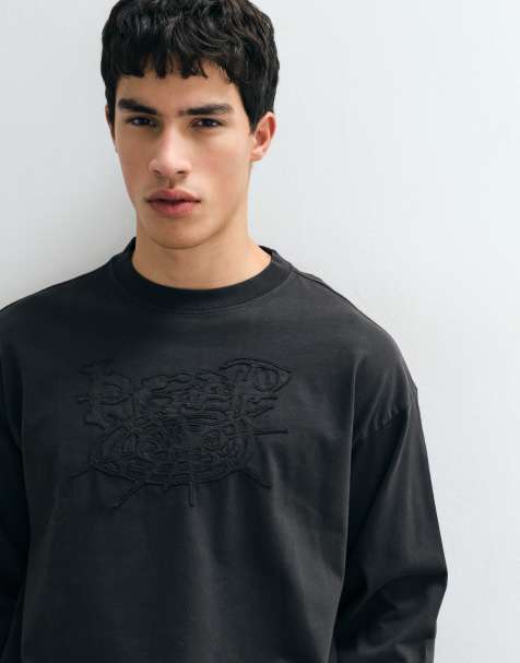 Weekday boxy oversized T-shirt met lange mouwen en geborduurde print in zwart met wassing - view 1