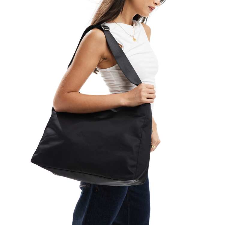 Weekday Carry oversized shoulder bag in black | ASOS