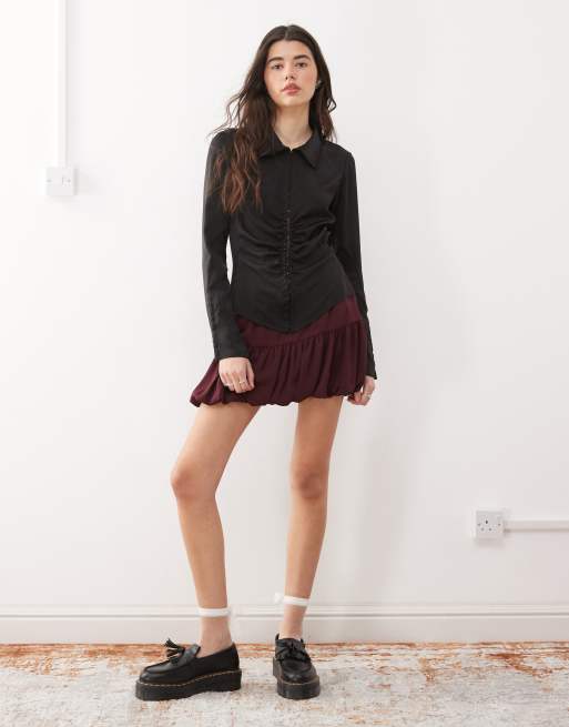 Chemise pour femme de couleur noire avec col noué 12421