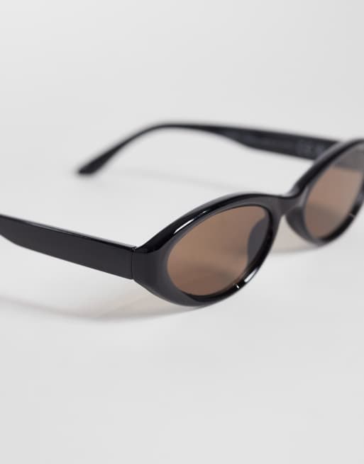 Weekday chunky oval sunglasses with brown lense in black, 2 of 3
