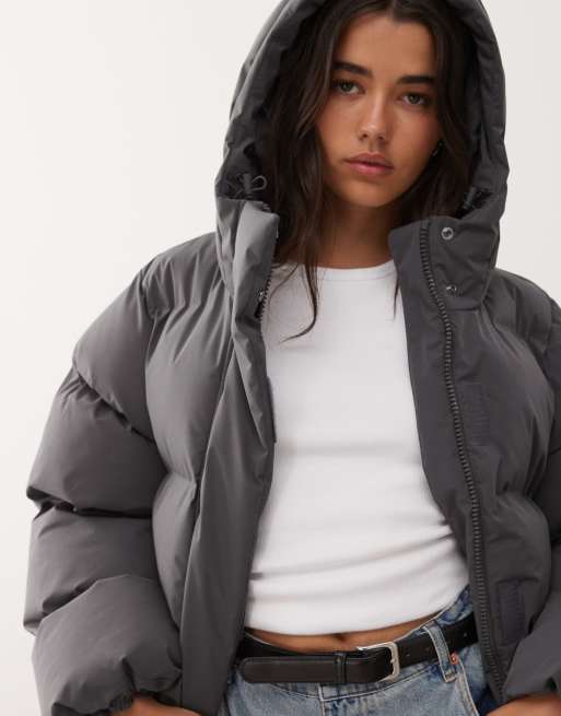 Weekday cinched puffer coat with detachable hood in dark