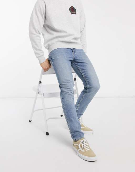 Weekday Cone Blå slim jeans i avsmalnande modell ASOS