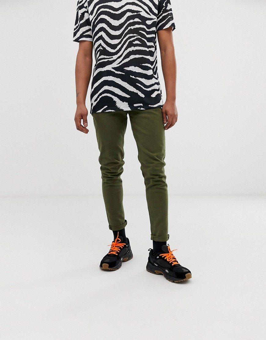 Weekday Cone slim tapered jeans in green
