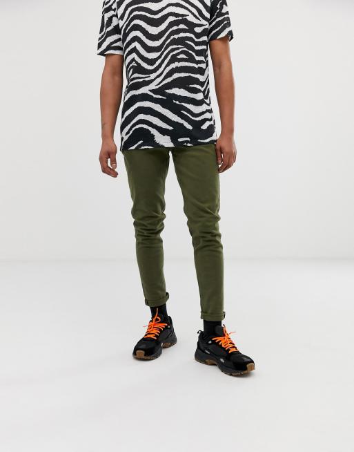 Weekday Cone slim tapered jeans in green ASOS