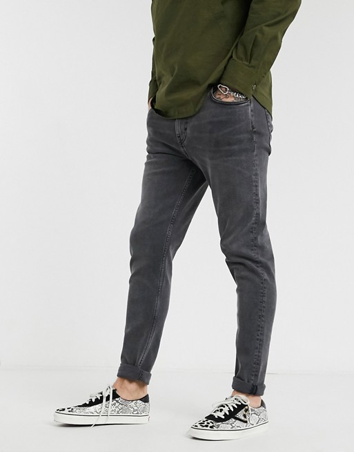 Weekday Cone tapered jeans in black