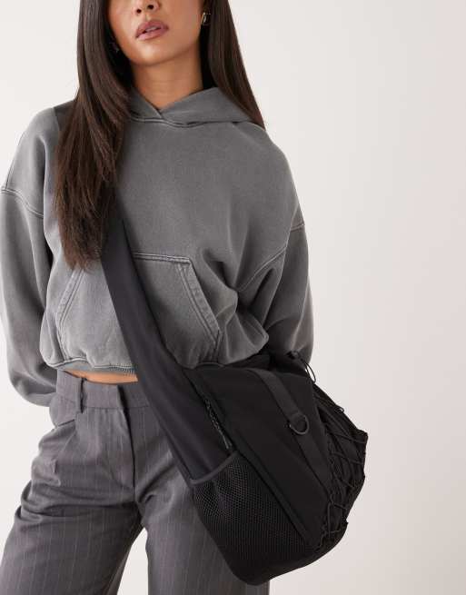 Weekday crossbody gym bag in black | ASOS