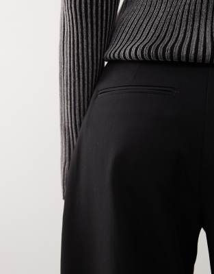 Weekday Dara low waist wide leg trousers with front pleats in black