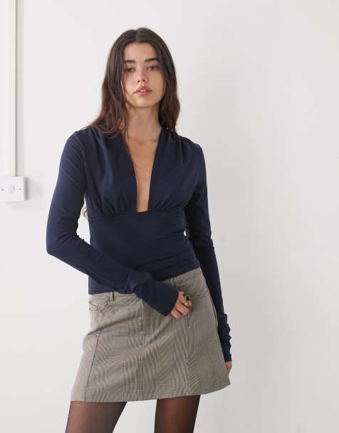Weekday deep halter neck long sleeve top in navy exclusive to ASOS