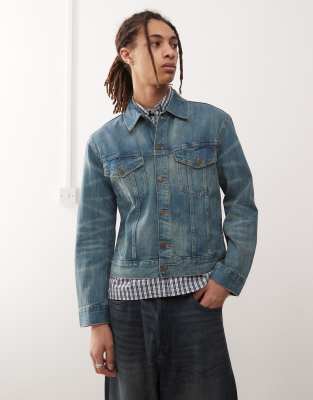 denim trucker jacket in mid blue wash