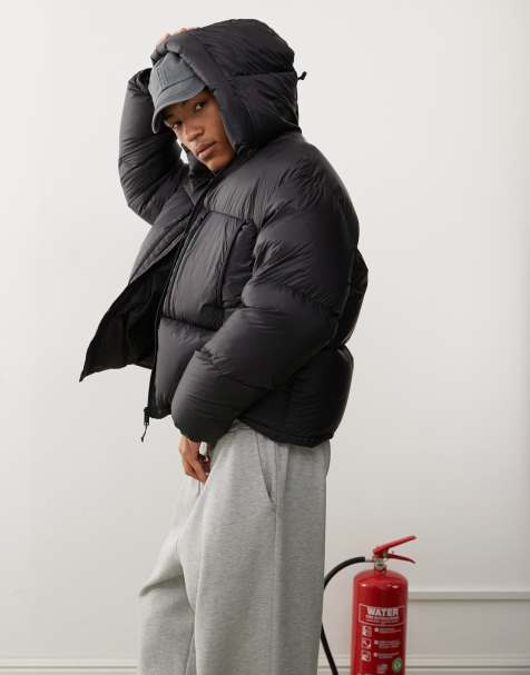 Weekday down hooded puffer coat with zip pockets in black - view 1