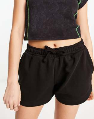 Weekday Essence jersey shorts in black exclusive to ASOS
