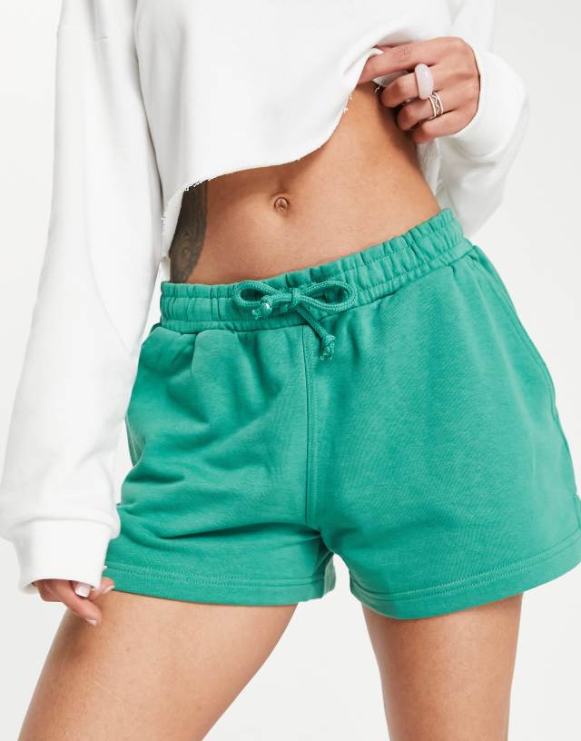 Weekday Essence jersey shorts in green