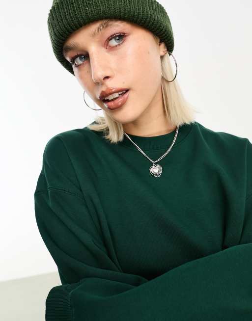 Weekday Essence standard fit sweatshirt in dark green | ASOS