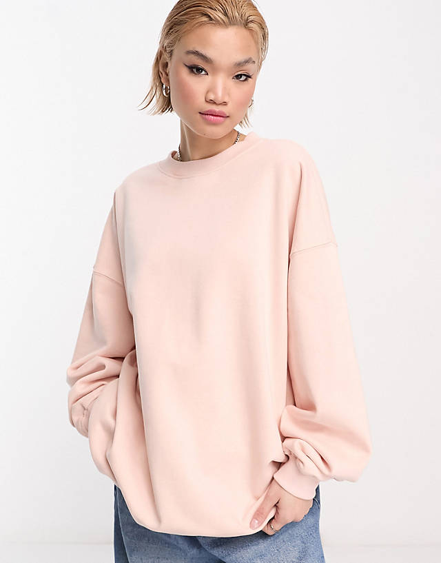 Weekday - exclusive super oversized sweatshirt in light pink