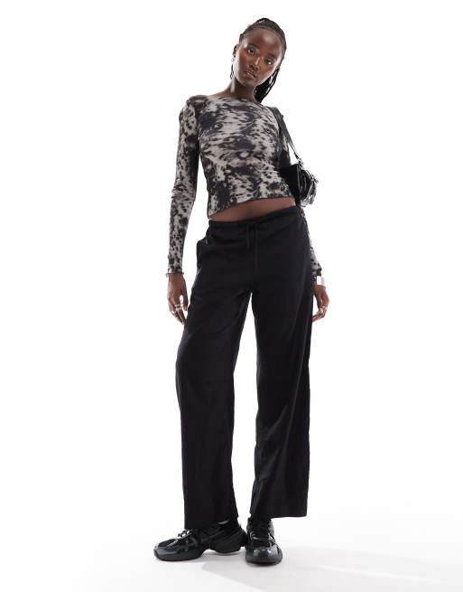 Weekday - Fair - Top a maniche lunghe con scollo a barchetta, cuciture invertite e stampa animalier, 3 di 4