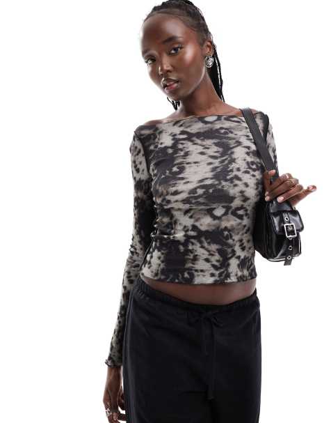Weekday Fair long sleeve boat neck top with reversed seams in animal print